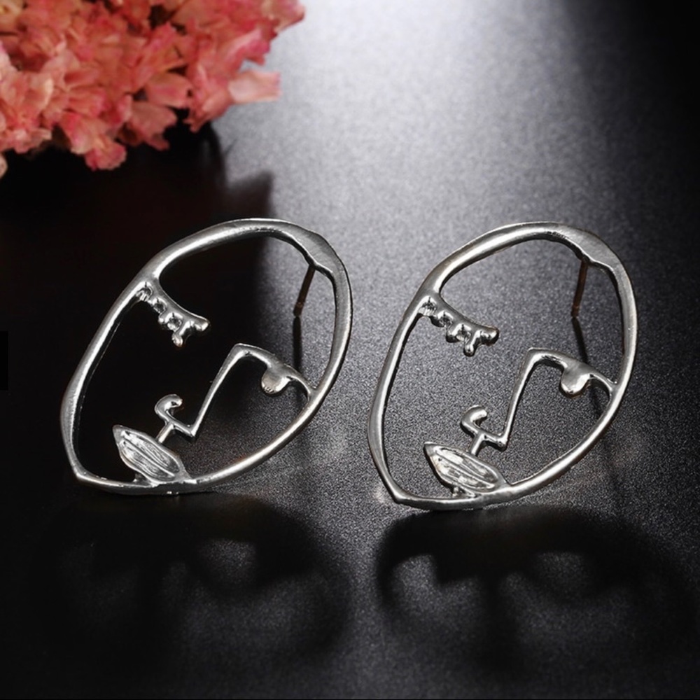 2/$20! Silver Abstract Visage Earrings - Picture 8 of 11